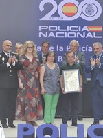 Down Burgos nombrada policía de honor.